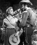 Piper Laurie and Rex Reason