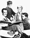 Hugh Beaumont, Tony Dow, Barbara Billingsley, and Jerry Mathers