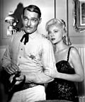 John Russell and Peggie Castle