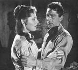 Richard Conte and Vivica Lindfors