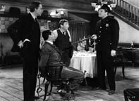 Raymond Massey, Cary Grant, Peter Lorre, and Jack Carson