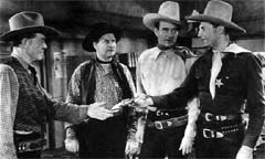 Dick Rush, Max Terhune, John Wayne, and Ray Crash Corrigan