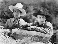 John Wayne and Raymond Hatton